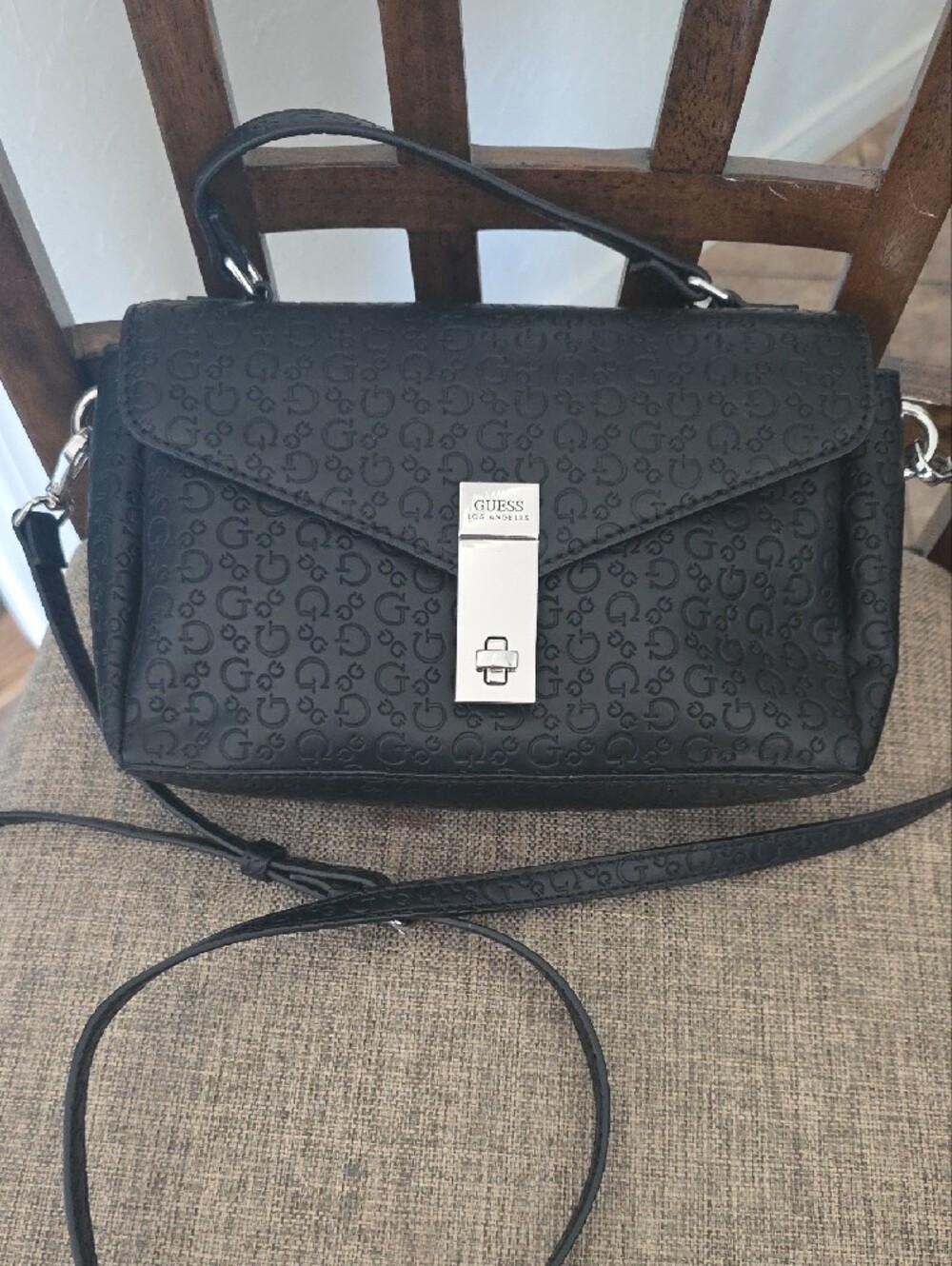 GUESS Black Embossed Logo Crossbody Bag with Silver Hardware